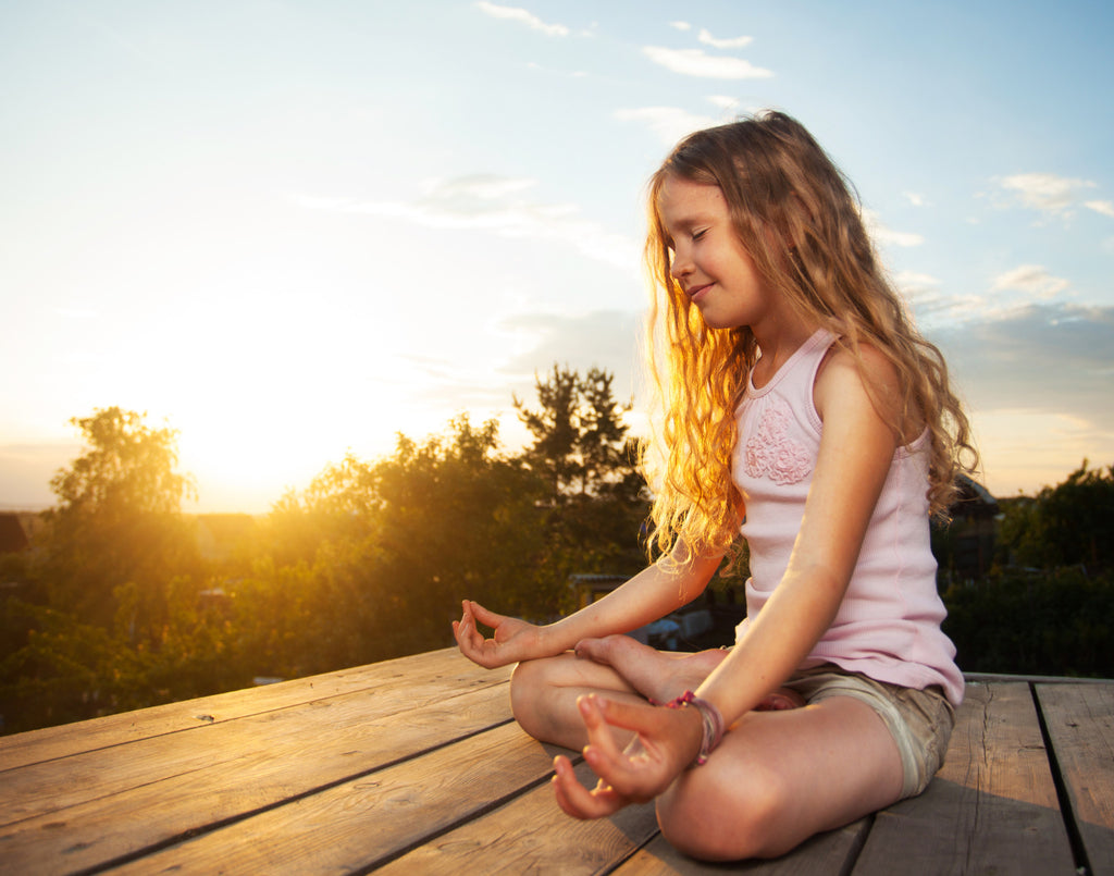 Little Girl Meditating Creating Zen